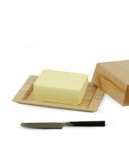 Sustainable wooden butter dish in natural color with butter and open lid