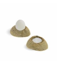 2 river stone egg cups in stone beige one with egg one salt