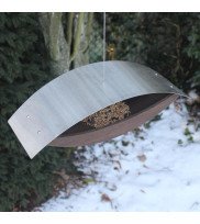 Modern bird house for hanging in oak smoked with stainless steel roof filled with bird food
