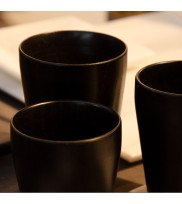 Table ambience with 3 wooden cups in black