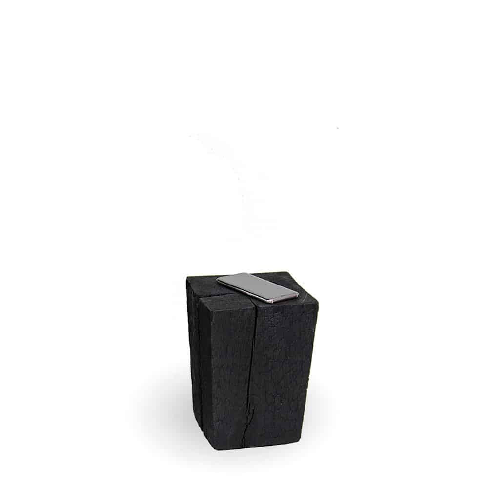 Small side stool in black with mobile phone