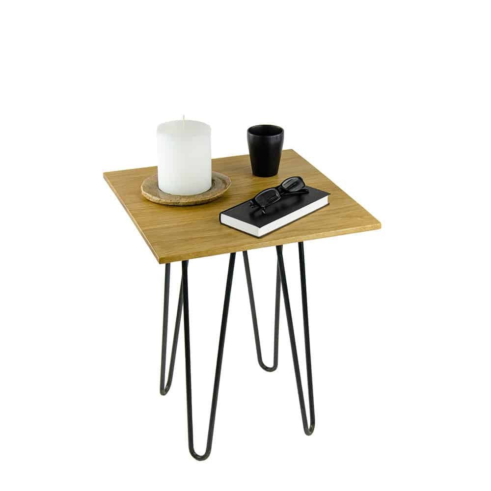 Square stool with hairpin table legs in natural oiled finish decorated as a tray or bedside table