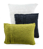 Sofa cushion hand knitted from ribbed yarn with ribbed part in 3 sizes and 3 colors