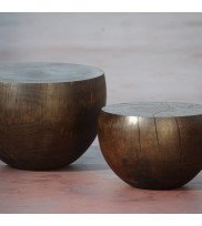 Round coffee table Tabola in two sizes made of smoked oiled oak standing on a steel floor