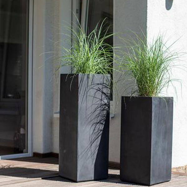 2 tall planters  Fleur | tower anthracite decorated with grass in house entrance