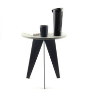 Side stool PACCO with concrete slab and 3 solid steel legs decorated with carafe, glass and book