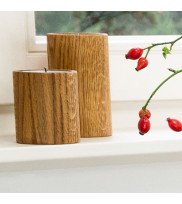 Tealight holder STUV 8 and 12 made of natural oiled oak on a windowsill with rose hips in the cut