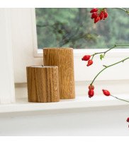 Tealight holder STUV 8 and 12 made of natural oiled oak on a windowsill with rose hips